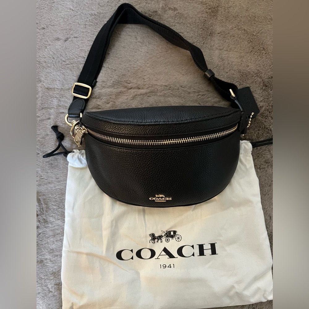 Coach bum/belt bag in black pebbled leather and gold hardware.